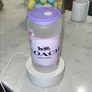 Frosted glass cup with straw